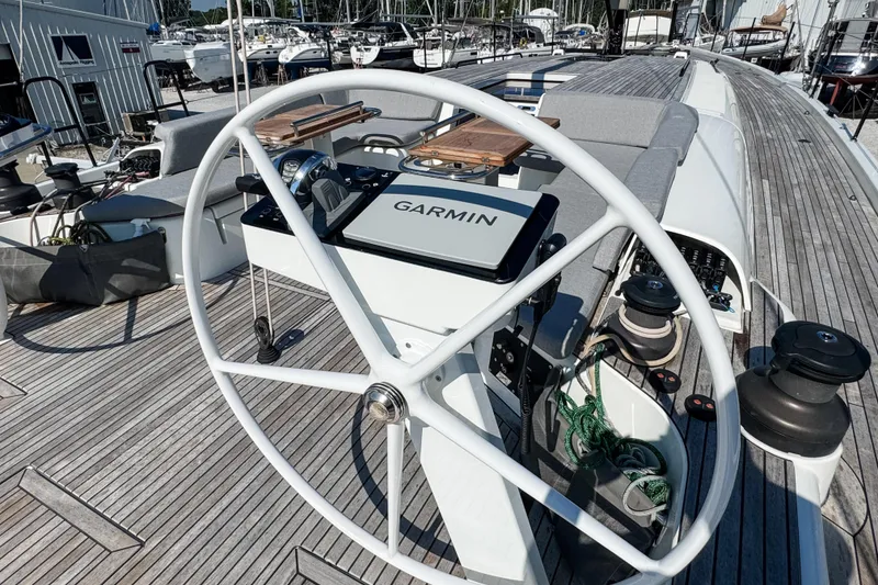 Slide: The Image of Steering wheel of 2024 Beneteau First 53 yacht with Garmin navigation system. - 6