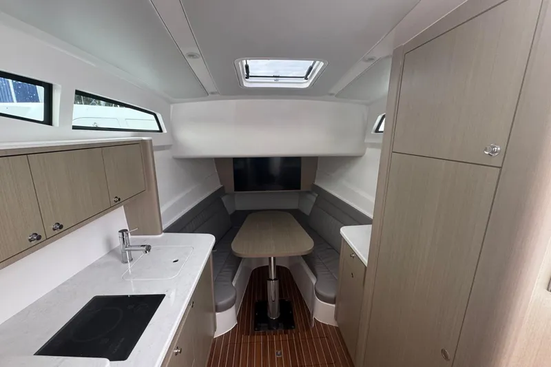 Slide: The Image of Luxurious interior of 2025 Intrepid 51 Panacea yacht with modern kitchen and seating area. - 6