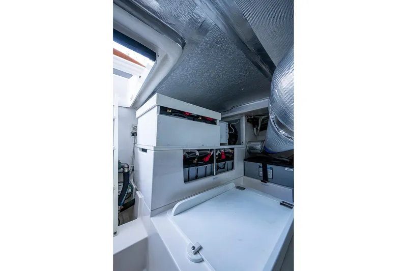 Slide: The Image of Engine room of 2018 Maritimo M54 yacht with Cummins Onan generator. - 81