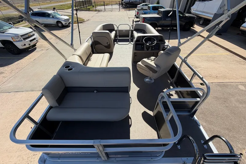 Slide: The Image of 2024 Sun Tracker Party Barge 18 DLX pontoon boat with spacious seating and modern design. - 10