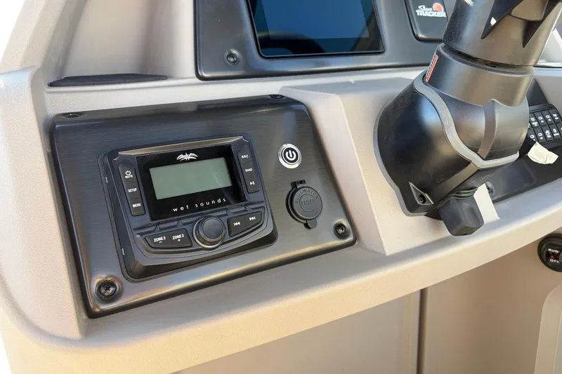 Slide: The Image of 2024 Sun Tracker Party Barge 18 DLX dashboard with Wet Sounds audio system. - 29