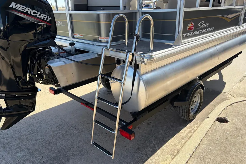 Slide: The Image of 2024 Sun Tracker Party Barge 18 DLX with Mercury engine and boarding ladder. - 9