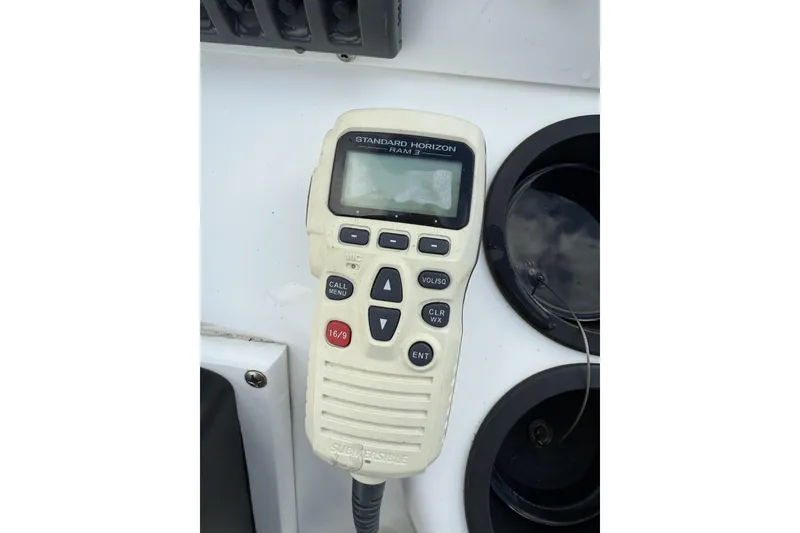 Slide: The Image of Standard Horizon RAM3 marine radio on 2004 Boston Whaler 190 Nantucket boat. - 17