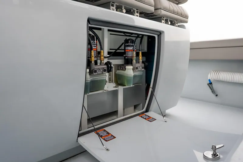 Slide: The Image of 2023 Valhalla Boatworks V-33 interior compartment with hydraulic system components. - 17