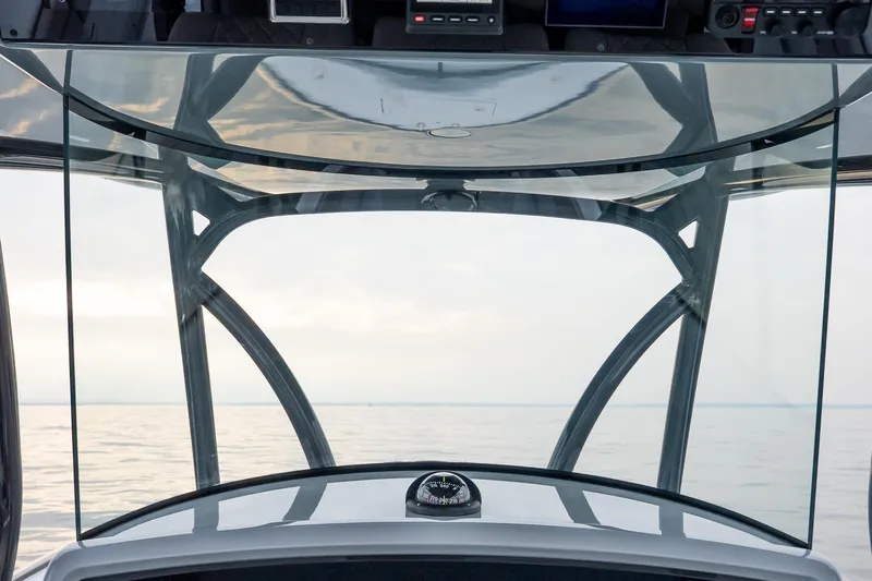 Slide: The Image of 2023 Valhalla Boatworks V-33 helm view with ocean horizon in background. - 26