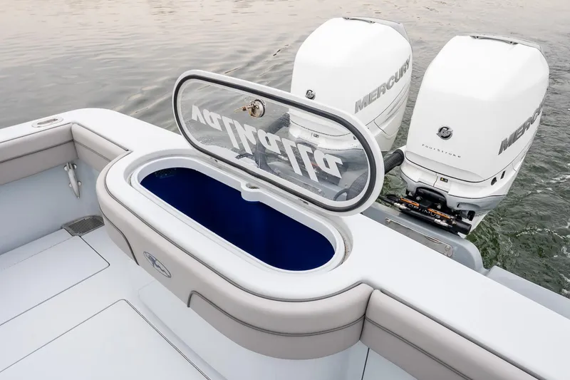 Slide: The Image of 2023 Valhalla Boatworks V-33 with dual Mercury outboard engines and open livewell. - 7