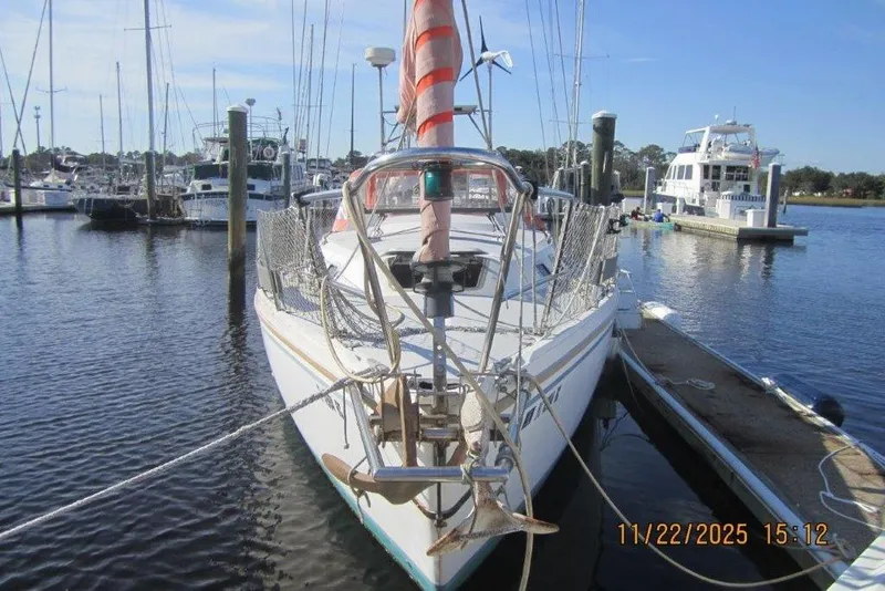 Slide: The Image of Catalina 30 MkII sailboat docked at marina, 1986 model, clear sunny day. - 3