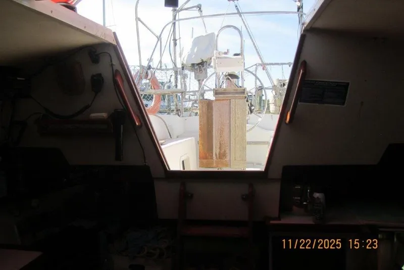 Slide: The Image of Interior view of 1986 Catalina 30 MkII sailboat, showing cockpit and equipment. - 40