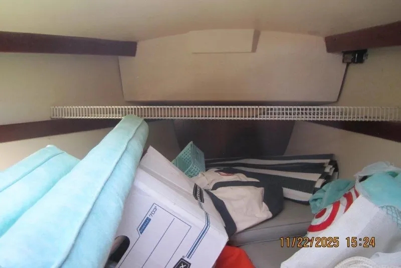 Slide: The Image of Interior cabin of 1986 Catalina 30 MkII sailboat with storage items. - 46