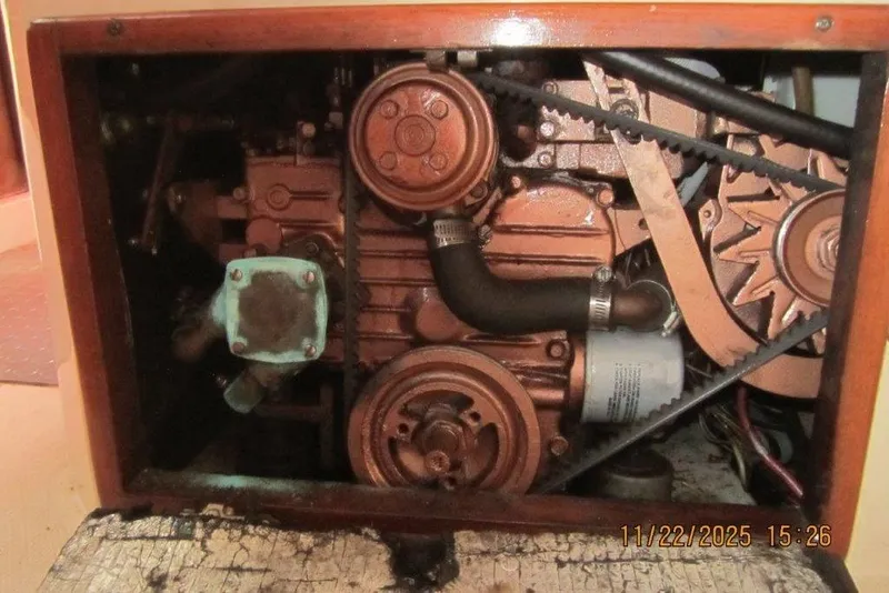 Slide: The Image of Engine compartment of a 1986 Catalina 30 MkII sailboat, showing belts and pulleys. - 51