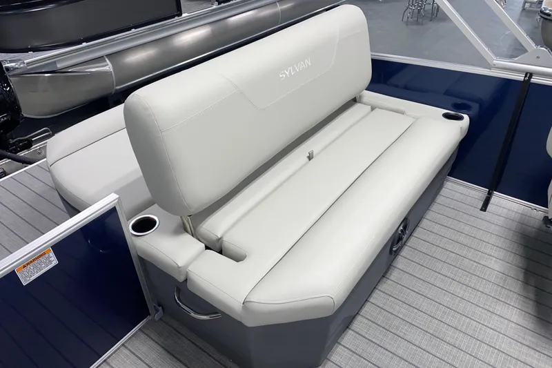 Slide: The Image of 2026 Sylvan Mirage 8522 CLZ DH boat with luxurious seating and cup holders. - 11