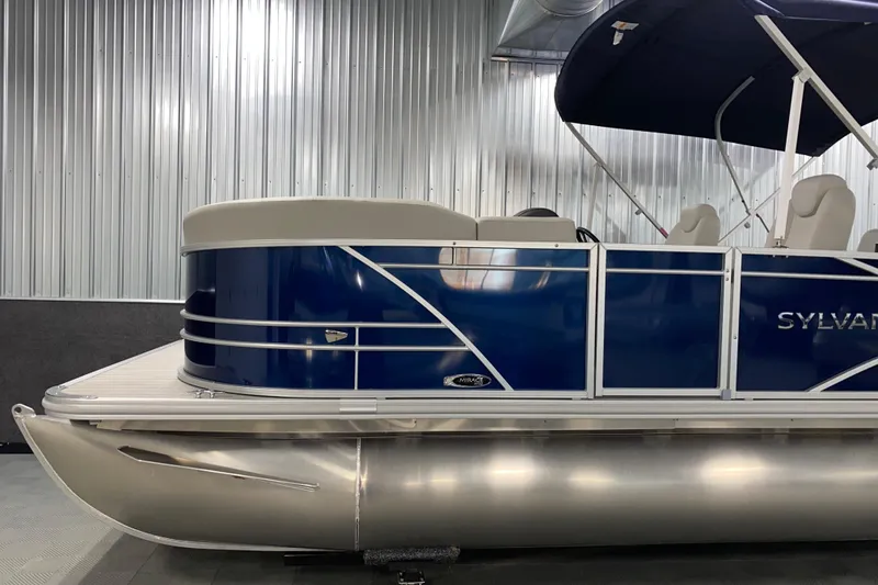 Slide: The Image of 2026 Sylvan Mirage 8522 CLZ DH pontoon boat with blue exterior and canopy. - 15