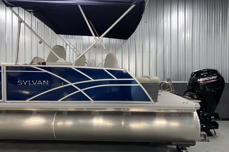 Slide: The Image of 2026 Sylvan Mirage 8522 CLZ DH pontoon boat with Mercury outboard motor. - 17