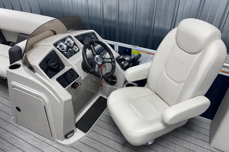 Slide: The Image of Captain's chair and helm of 2026 Sylvan Mirage 8522 CLZ DH pontoon boat. - 7
