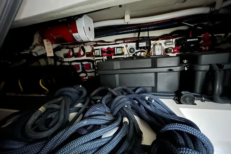 Slide: The Image of Electrical and mechanical components in cockpit storage "basement". - 18