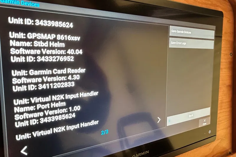 Slide: The Image of Garmin device screen displaying software versions and IDs - 28