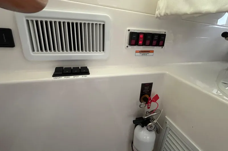 Slide: The Image of Hel deck air conditioning, battery switches and fire extinguisher. - 35