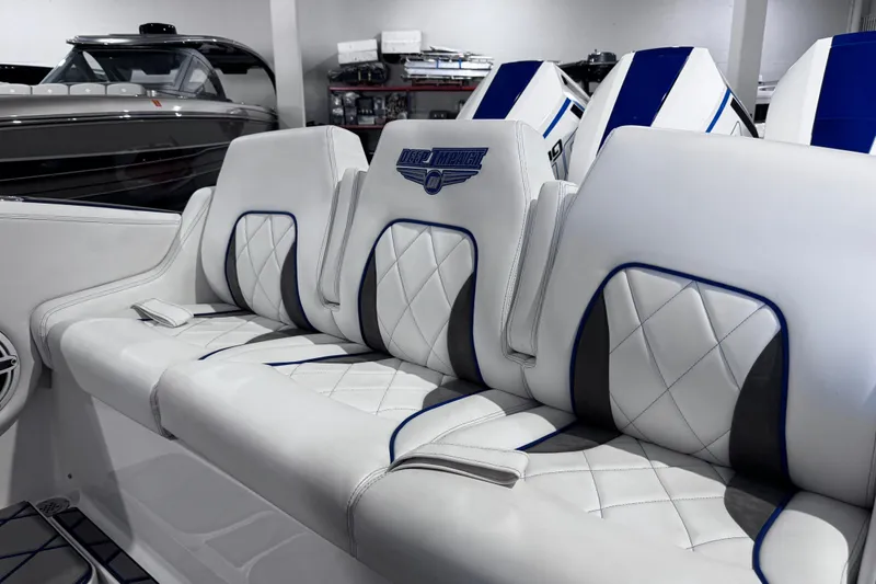 Slide: The Image of 2024 Deep Impact 399 Sport boat interior with sink and cup holders. - 11