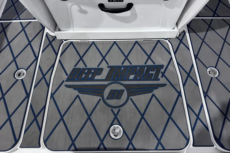 Slide: The Image of 2024 Deep Impact 399 Sport boat dashboard with modern controls and steering wheel. - 14