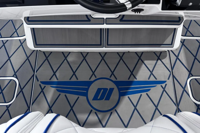 Slide: The Image of 2024 Deep Impact 399 Sport boat interior with steering wheel and custom flooring design. - 23