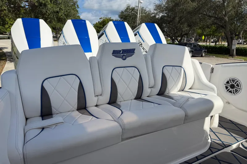 Slide: The Image of Luxury seating on 2024 Deep Impact 399 Sport boat with powerful engines. - 28