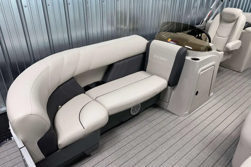 Slide: The Image of 2026 Sylvan Mirage 8522 LZ boat interior with luxurious seating and modern design. - 1