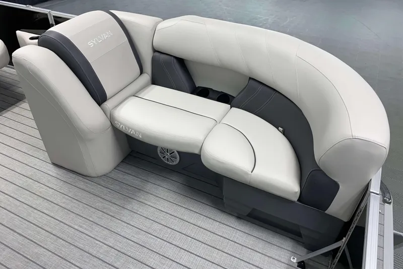 Slide: The Image of 2026 Sylvan Mirage 8522 LZ boat seating with gray and black upholstery. - 2