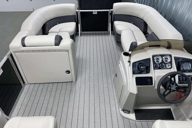 Slide: The Image of Luxurious interior of 2026 Sylvan Mirage 8522 LZ pontoon boat with plush seating and modern dashboard. - 4