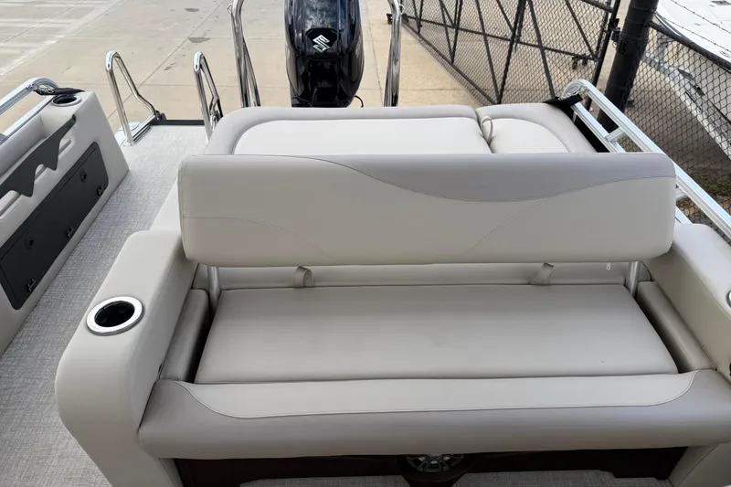 Slide: The Image of 2026 Avalon LSZ Versatile Rear Bench boat interior with plush seating and cup holders. - 15