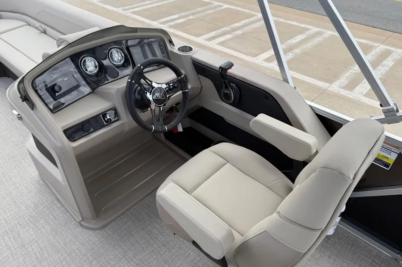Slide: The Image of 2026 Avalon LSZ Versatile Rear Bench boat helm with modern controls and comfortable seating. - 17