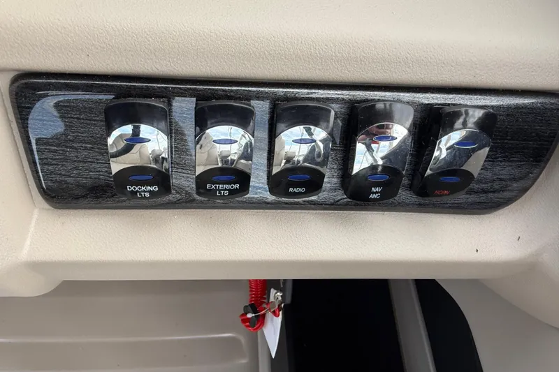 Slide: The Image of Control panel of 2026 Avalon LSZ Versatile Rear Bench with labeled switches. - 23