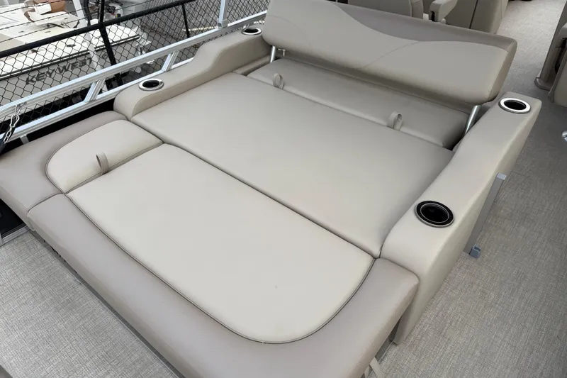 Slide: The Image of 2026 Avalon LSZ Versatile Rear Bench with cup holders on a boat deck. - 36