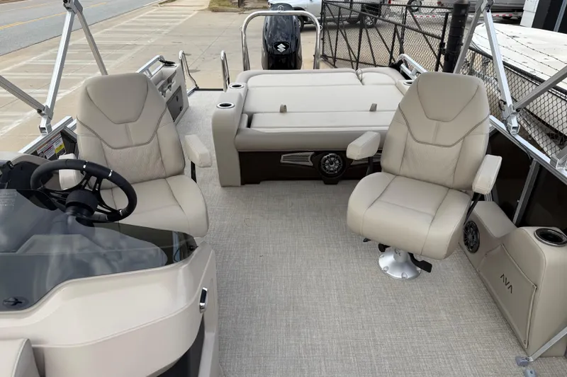 Slide: The Image of 2026 Avalon LSZ Versatile Rear Bench boat interior with plush seating and modern steering console. - 38