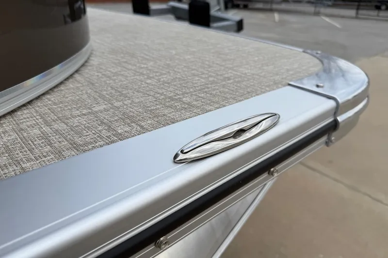 Slide: The Image of 2026 Avalon LSZ Versatile Rear Bench boat detail with sleek metallic finish. - 42