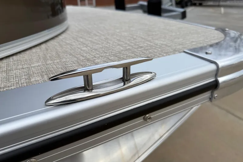 Slide: The Image of 2026 Avalon LSZ Versatile Rear Bench boat cleat detail, showcasing sleek design and craftsmanship. - 43