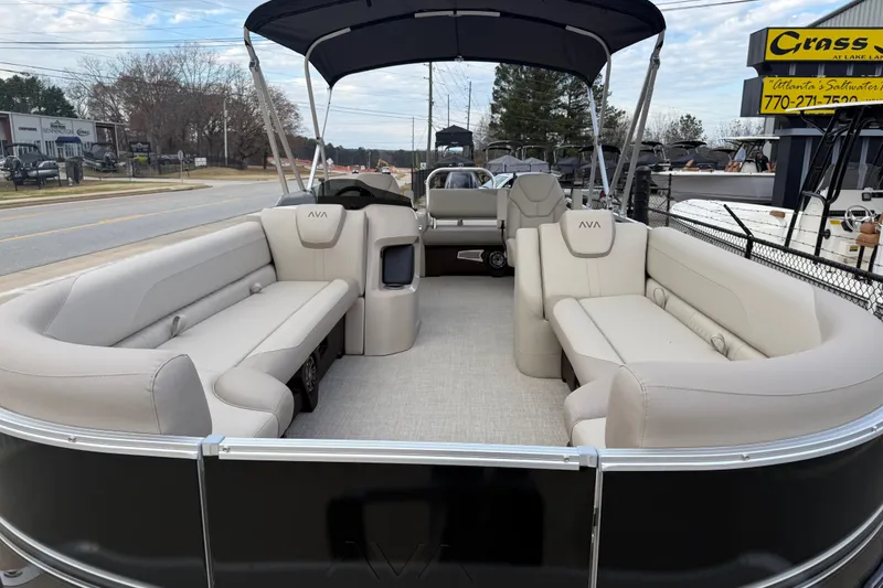 Slide: The Image of 2026 Avalon LSZ Versatile Rear Bench pontoon boat with spacious seating and canopy. - 8