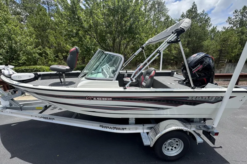 The Image of 2020 Ranger VS1682 WT fishing boat on trailer, parked outdoors. - 0