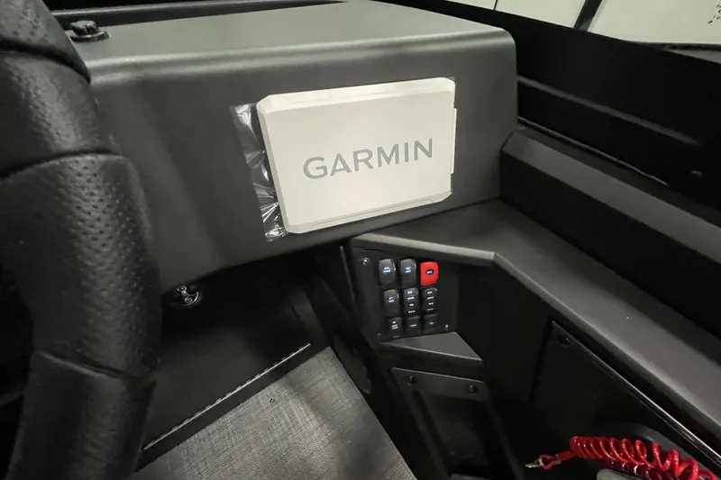 Slide: The Image of 2026 Alumacraft Competitor 175X Sport dashboard featuring Garmin navigation system. - 15