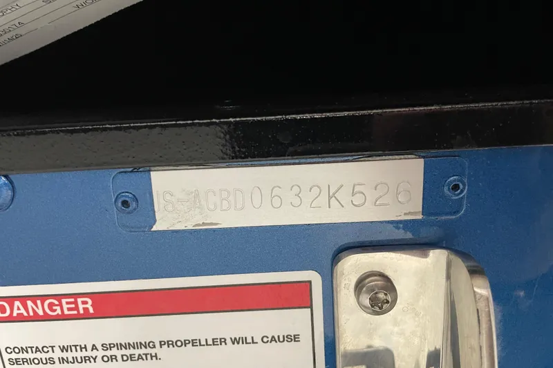 Slide: The Image of 2026 Alumacraft Competitor 175X Sport boat identification plate and safety warning label. - 20