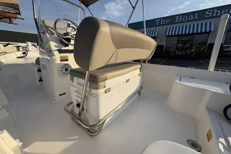 Slide: The Image of 2023 Key West 1720 Center Console boat interior with seating and console view. - 10