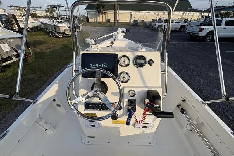 Slide: The Image of 2023 Key West 1720 Center Console boat dashboard with Garmin navigation system. - 14