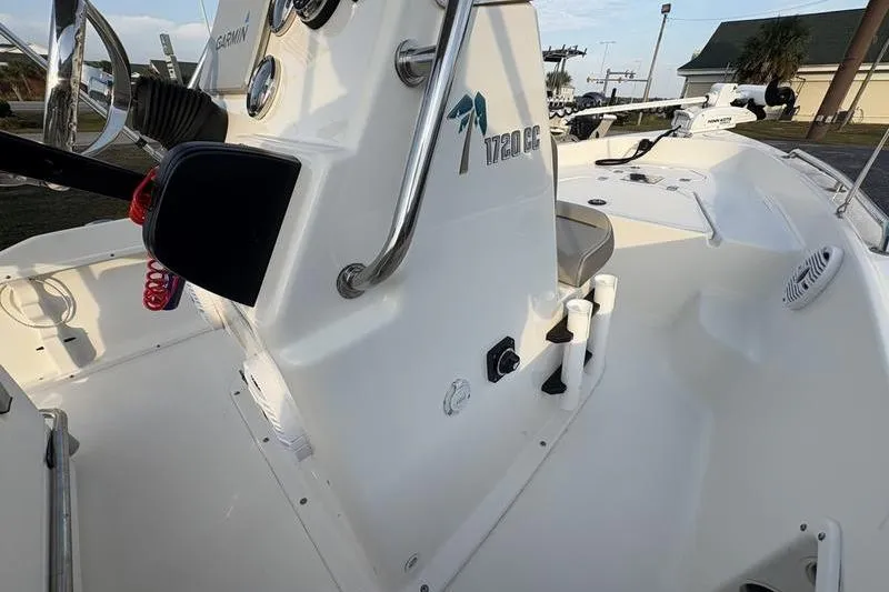 Slide: The Image of 2023 Key West 1720 Center Console boat interior with steering and controls. - 19