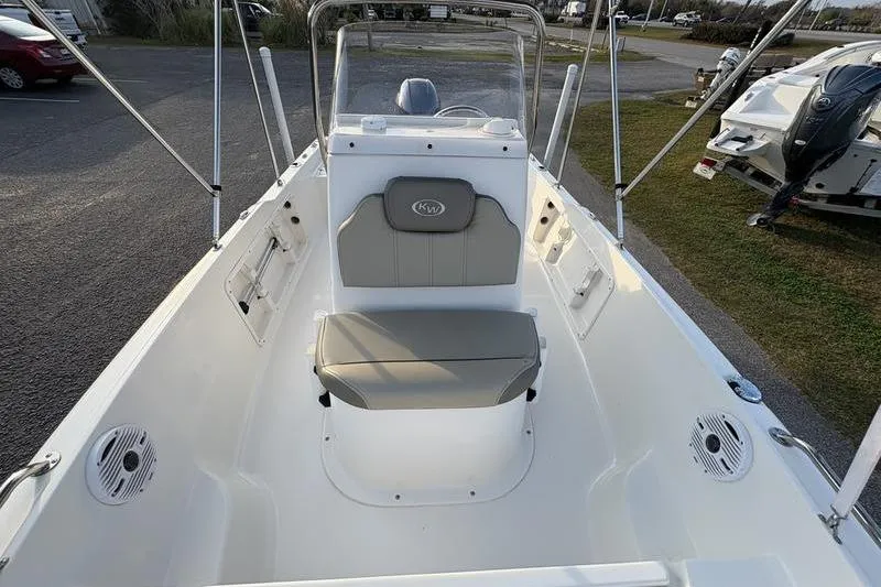Slide: The Image of 2023 Key West 1720 Center Console boat interior with seating and console view. - 23