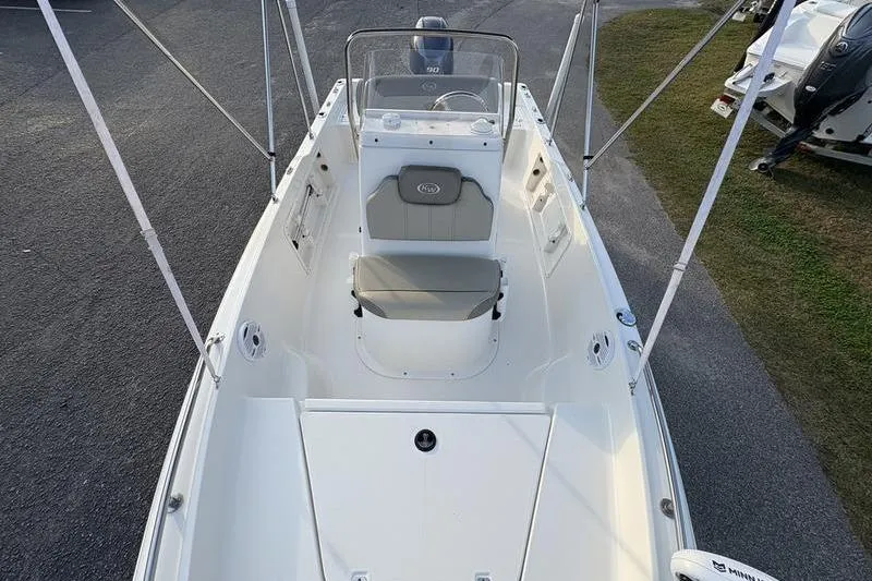 Slide: The Image of 2023 Key West 1720 Center Console boat, top view, showcasing seating and console layout. - 27