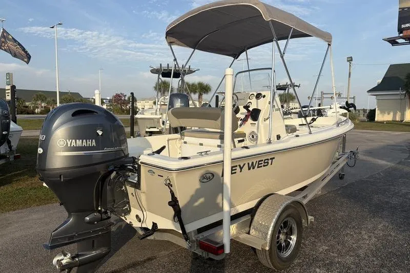 Slide: The Image of 2023 Key West 1720 Center Console boat with Yamaha engine on trailer. - 4