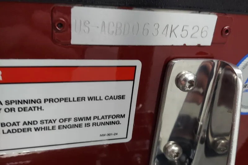 Slide: The Image of 2026 Alumacraft Competitor 175X Sport boat warning label and serial number plate. - 12