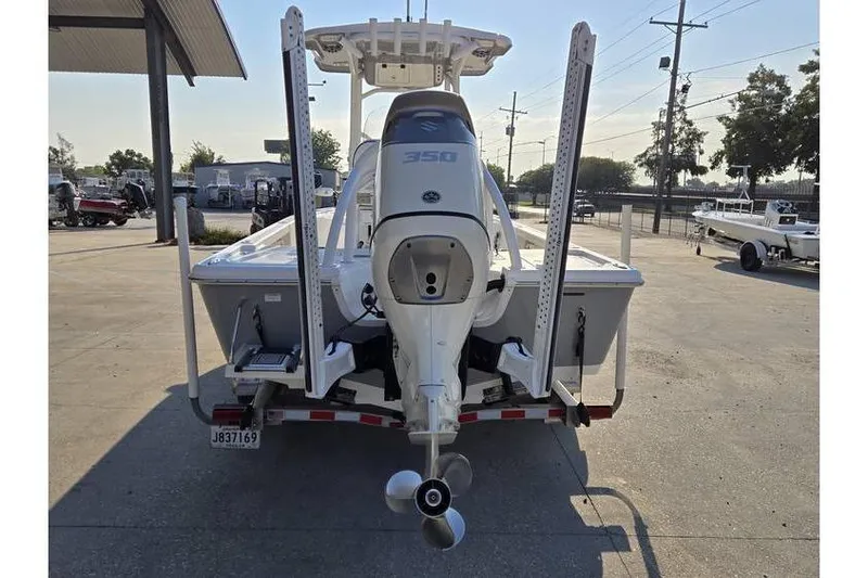 Slide: The Image of 2021 Sea Pro 248 Bay boat with powerful 350 engine, rear view. - 6