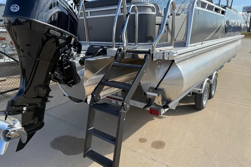 Slide: The Image of 2026 Avalon LSZ Versatile Rear Lounger pontoon boat with Suzuki outboard motor and ladder. - 10