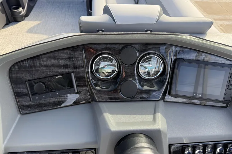 Slide: The Image of Dashboard of 2026 Avalon LSZ Versatile Rear Lounger with gauges and Garmin display. - 23