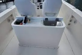 Slide: The Image of 2017 Stamas 308 Predator boat interior with seating and storage compartments. - 12